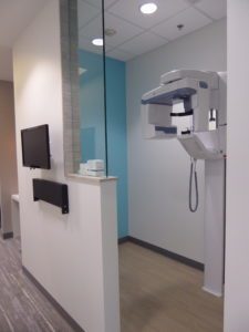 photo of upright panoramic digital X-ray machine in the office